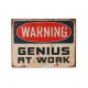 Plaque métal : Genius at Work, H 33 cm